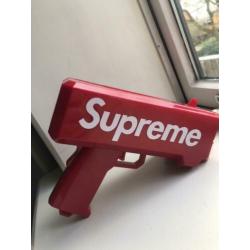 Supreme money gun