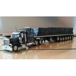 Peterbilt met 8 asser trailer inclusief lading.
