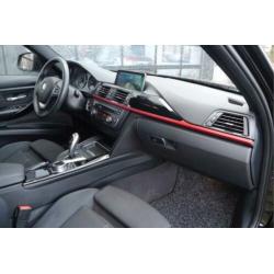 BMW 3 Serie Touring 330d xDrive High Executive / Sporstoelen