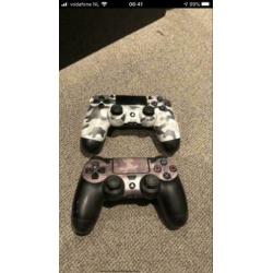 Playstation4 met controllers, spellen en benodigde kabels.