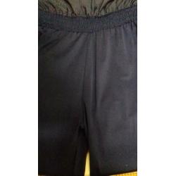 Jumpsuit blauw maat 152/158.