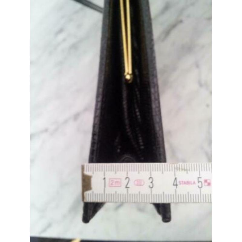 Vintage handtas van hagedisleer te koop