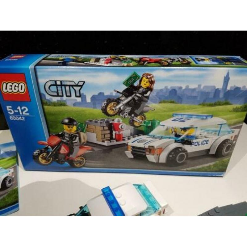 t.k. lego 60042 city met doos en sticker vel