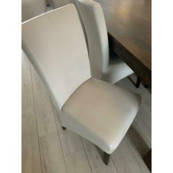 Bruine Eettafel 200x100cm met 6 GRATIS witte stoelen.