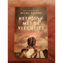 Boek "Het meisje met de vlechtjes". Oorlogsroman.