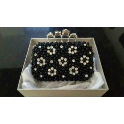 Gave handgemaakte clutch