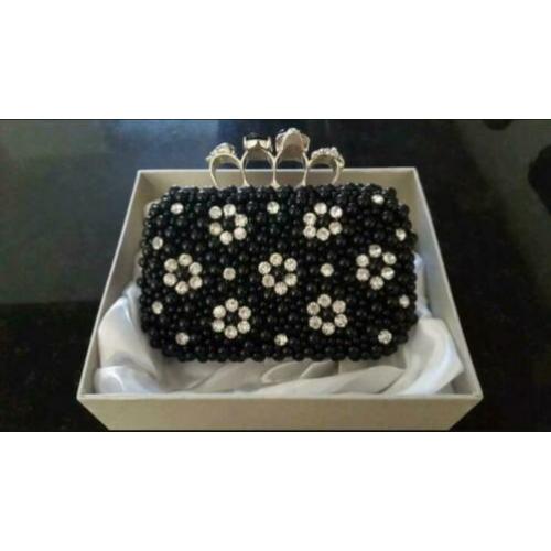 Gave handgemaakte clutch