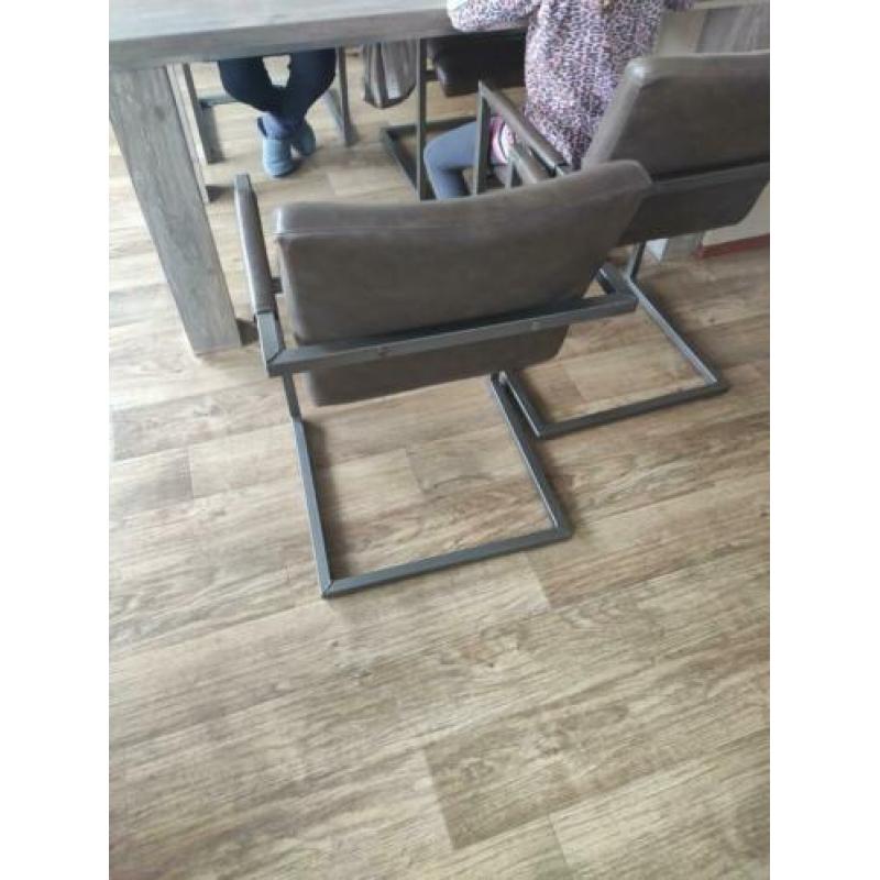 4 leren eetstoelen