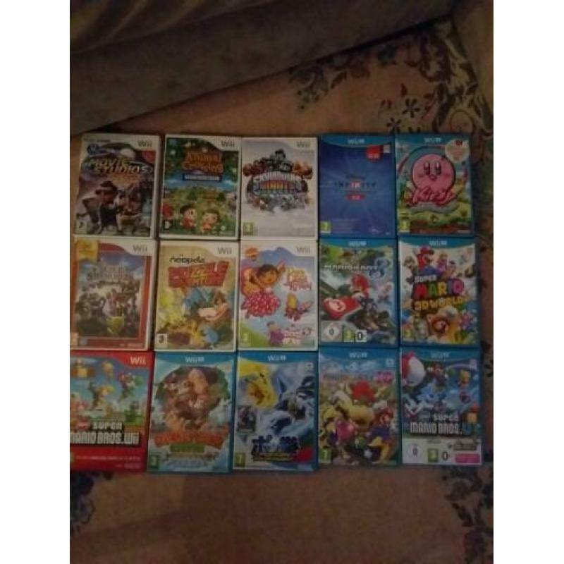 Wii u spelcomputer + 2 controllers+ n-chucks 15 spellen