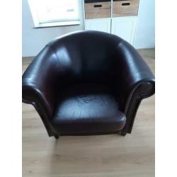 Leren bruine fauteuil.