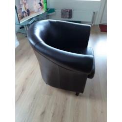Leren bruine fauteuil.