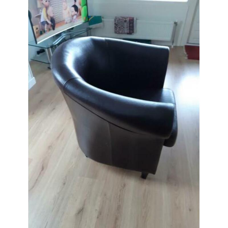 Leren bruine fauteuil.