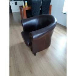 Leren bruine fauteuil.