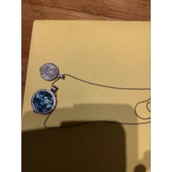 Mi moneda ketting met 2 hangers.