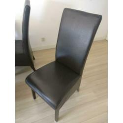 4 zwarte leren eetkamerstoelen