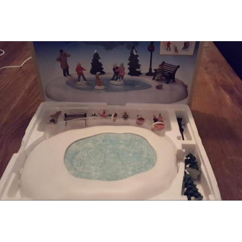 Bewegende schaatsbaan en diverse poppetjes